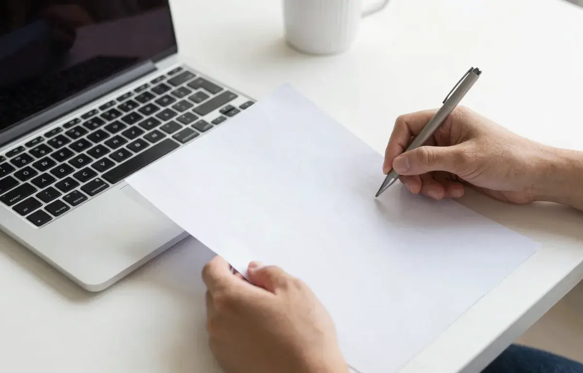 FaxZero review, sending a free fax from a laptop on a bright desk