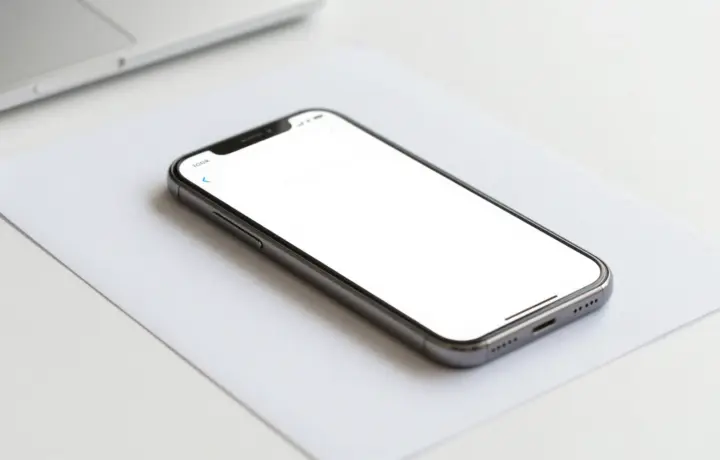 Person sending a fax from a phone facing a free fax app subscription paywall
